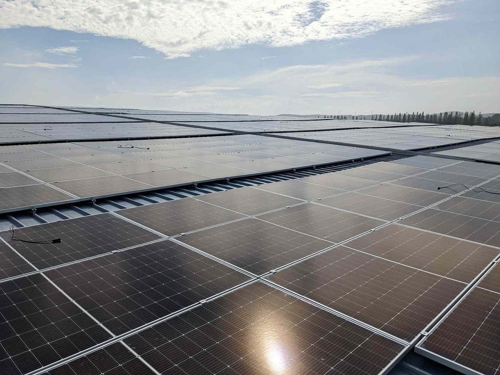 Residential solar panels exposed to sunlight on a Malaysian home rooftop 